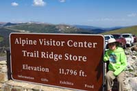 097-Kenny_shows_off_his_Junior_Ranger_Badge_at_Alpine_Visitor_Center-11796_feet