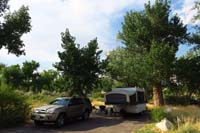 053-our_campsite-all_windows_are_open_since_98_degrees,but_nice_shade_from_cottonwoods