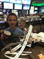 11-Kenny_at_newly_opened_Dave_and_Busters_for_Bryson's_birthday_party-look_at_all_the_tickets_he_earned