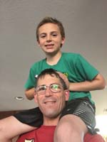 32-Kenny_on_Daddy's_shoulders-selfie_using_his_new_phone