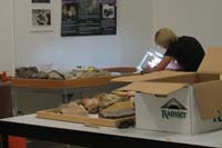 47-processing_unknown_dinosaur_bones_about_98_MY_found_2008_by_hiker_in_VOF
