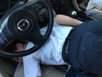 65-this_is_how_Kenny_relaxes_in_Daddy's_car_during_car_line_waiting_in_the_morning