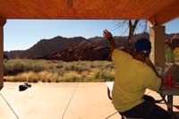 04-Joel_waving_to_Sierra_in_distance_on_peak-alcove_out_there_too