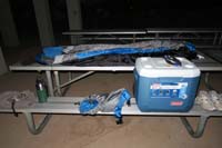 17-Daddy_gets_to_sleep_on_the_metal_table_in_the_open_above_ground