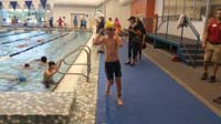 08-Kenny_finished_swimming_strong-running_to_transition