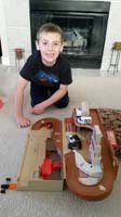 50-Thankgiving_Day-playing_with_a_toy_at_Grammy_and_Grandpa_Duke's_house