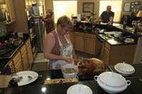 55-checking_the_stuffing_in_the_bird-bird_is_not_ready_yet-another_hour