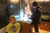 19-Kenny_and_Mommy_in_camper_preparing_dinner