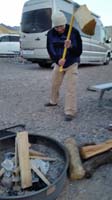 75-Daddy_chopping_wood_for_a_campfire
