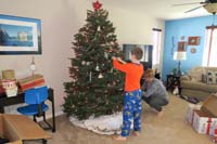 014-Mommy_and_Kenny_decorate_Christmas_tree