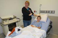 066-Mommy_with_Kenny_in_good_spirits_ready_for_the_procedure-0730am