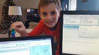 106-Kenny_plays_while_Mommy_works-Mommy_worked_in_dining_room_to_watch_over_Kenny_recovering