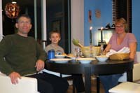 110-family_enjoying_great_New_Years_Eve_dinner_made_by_Mommy