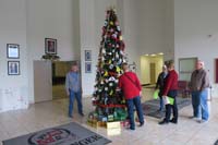 44-family_looking_for_Kenny's_ornament_on_the_Challenger_Christmas_Tree