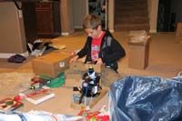 20-trying_to_pull_out_all_the_pieces_from_the_box