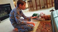 20-Christmas_Eve_night_at_Grammy_and_Grandpa_Dukes-Kenny_playing_with_Luke