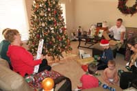 49-presents_handed_out,group_ready_to_open_them