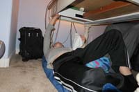 01-interesting_way_to_watch_his_Kindle-under_Mommy's_desk_while_she_works_after_dinner