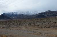 56-zoom_of_mountains_behind_our_house_after_series_of_winter_storms_blew_through_area-more_snow_in_clouds