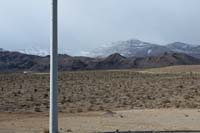 57-zoom_of_mountains_behind_our_house_after_series_of_winter_storms_blew_through_area-more_snow_in_clouds