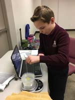 61-Rock_Hound_Science_Olympiad_practice_at_Challenger_School-Kenny_measuring_specific_gravity_of_sulfur