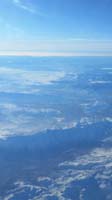 49-Mommy_really_liked_all_the_snow_for_the_entire_flight,although_looking_into_sun,bad_for_pictures