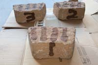03-flagstone_is_painted_for_three_trials_to_remove_brown_spray_paint