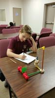 39-Kenny_working_hard_describing_item_for_Science_Olympiad_Write-It,Do-It_event