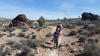 19-Daddy_and_Kenny_on_the_trail-interesting_rocks_with_fossils