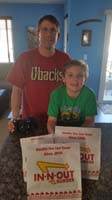 33-Daddy_and_Kenny_ready_to_dig_in_to_the_food