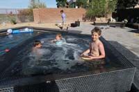 53-Kenny_in_the_jacuzzi-virgin_daquari_in_floating_coaster-no_sunscreen-getting_burned