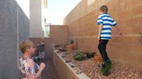 55-Kenny_hunting_for_Easter_eggs_and_presents_in_our_small_backyard