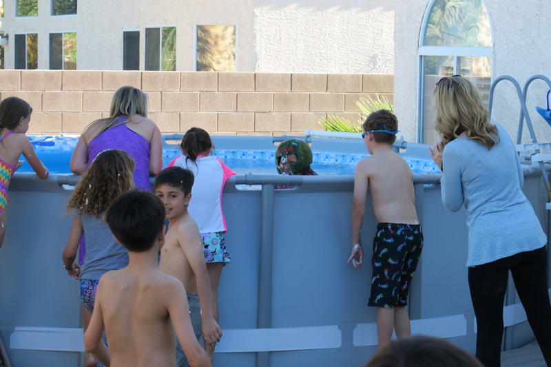 083-Ella_rinses_off_in_the_pool
