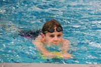 011-swimming_with_paddle_board_to_work_on_legs