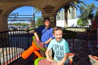 023-Daddy_and_Kenny_playing_drums_at_Tivoli_Village_kid_play_area