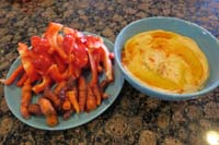 047-eating_our_home_grown_carrots_and_hummus_Mommy_made