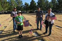 098-ready_to_place_flags_on_gravesites