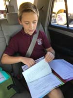 14-Kenny_is_excited_to_show_us_his_Friday_folder