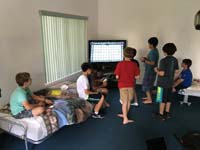 16-Rishi's_10th_birthday_party-kids_playing_video_games_in_a_casita