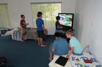 18-kids_enjoying_playing_video_games_with_each_other