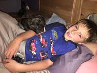 59-Kenny_really_likes_relaxing_in_bed_at_night_with_Mommy_and_Rainier