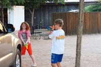 06-Nick_and_Kenny_playing_with_water_guns-Kenny_prepared_wearing_his_swim_goggles