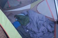 11-Kenny_sleeping-no_tent_cover_since_warm-Kenny_bundled_up,Mommy_and_Daddy_slept_with_sheet