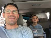 16-Daddy_with_car_sick_Kenny_holding_his_bucket