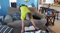 38-interesting_way_to_read-that_is_Darby's_dog_on_the_couch
