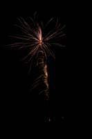 17-neighbors_blowing_mortar_fireworks_from_desert_behind_house
