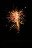 19-neighbors_blowing_mortar_fireworks_from_desert_behind_house