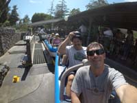 46-adults_ready_for_Matterhorn_Bobsleds-Mommy_waits_with_Zoe_and_Kenny