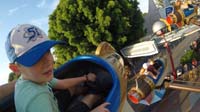 67-Kenny_and_Daddy_having_fun_on_the_Astro_Orbitor_ride,Darby_and_Zoe_below_up
