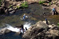 25-while_heading_back,zoomed_in_to_catch_Kenny_playing_in_the_water_at_lower_falls_pool_area